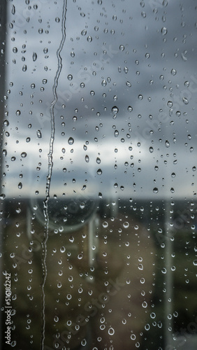 Raindrops on a window glass close-up