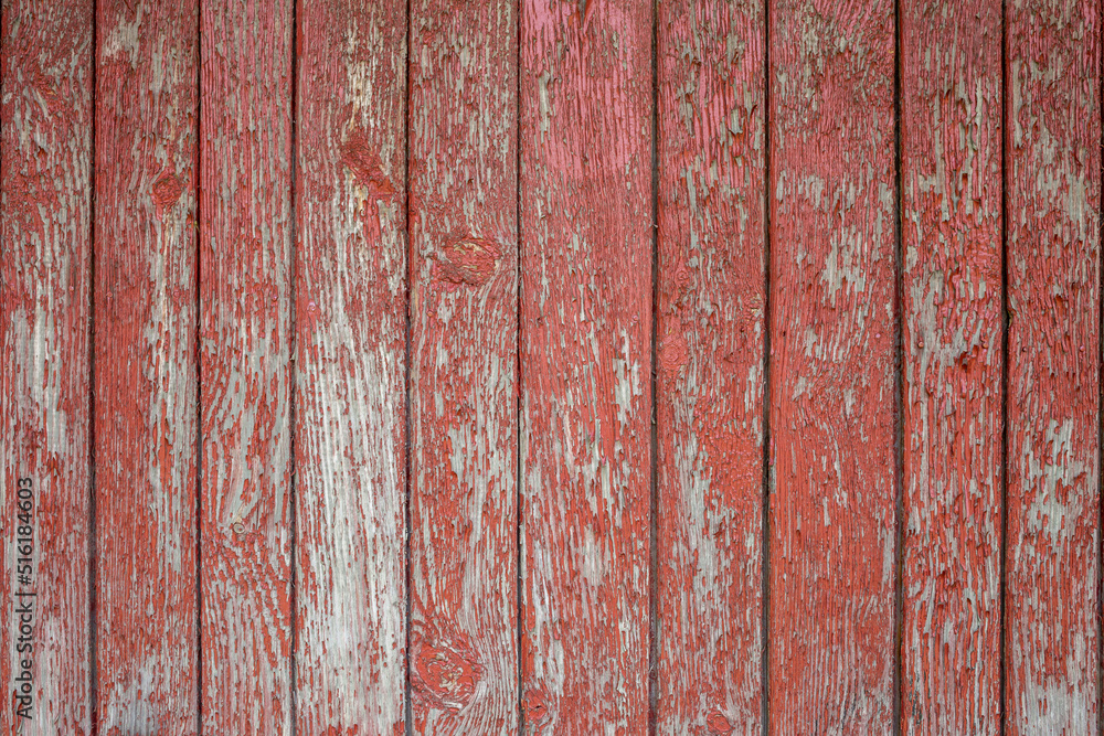 The old red wood texture with natural patterns The old red wood texture with natural patterns