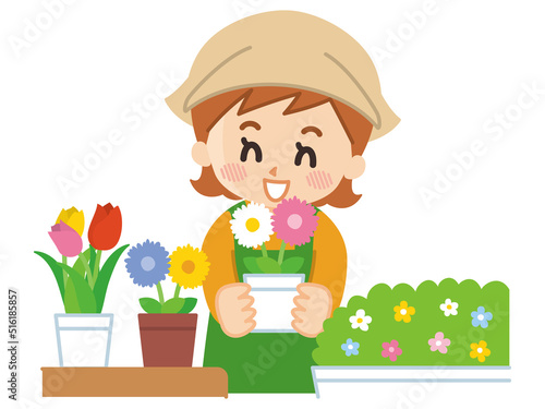 綺麗な花を持った花屋店員の女性