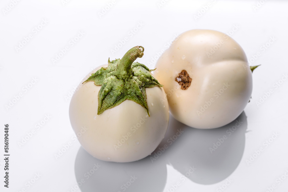 Fresh white eggplant ripped from the garden by the house Fresh white eggplant ripped from the garden by the house