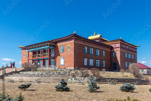 Buddhist temple in the capital of Buryatia Ulan-Ude against the blue sky photo