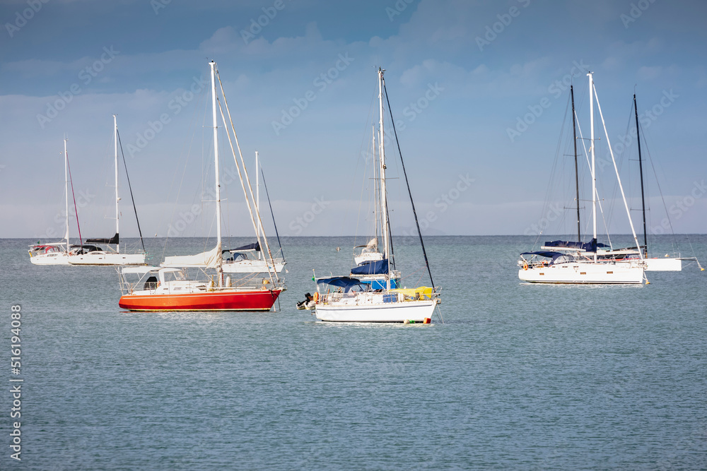 Bay with boats and sailboats in Jurere beach at sunset Florianopolis, Brazil