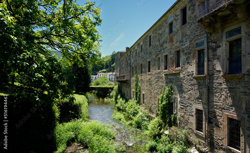 View of the landmark monastery of Samos alongside Sarria river in the Galicia region of Spain, right on Saint James way.