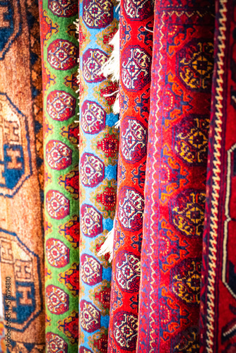 carpets in the market, bazaar, uzbek, Uzbekistan, Buchara, Buxoro, Bukhara, Uzbekistan, silk road, central asia © Andrea Aigner
