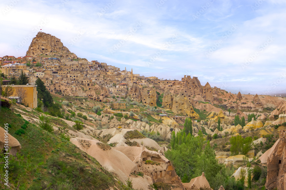 Side view of Uchisar Castle nad Pigeon Valley of Cappadocia, Nevsehir, Turkey.