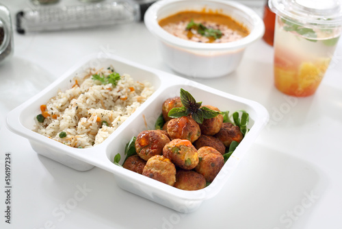 Box diet.  Lunch box, vegetable meatballs with rice, and vegetables.
