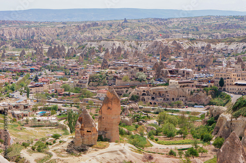Aerial view of Cappadocia, fairy chimneys, town, nature and hills, Urgup, Nevsehir, Anatolia Region of Turkey.