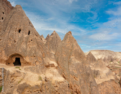 Cave dwellings, fairy chimneys and landscape of Cappadocia, Goreme National Park of Nevsehir, Turkey.