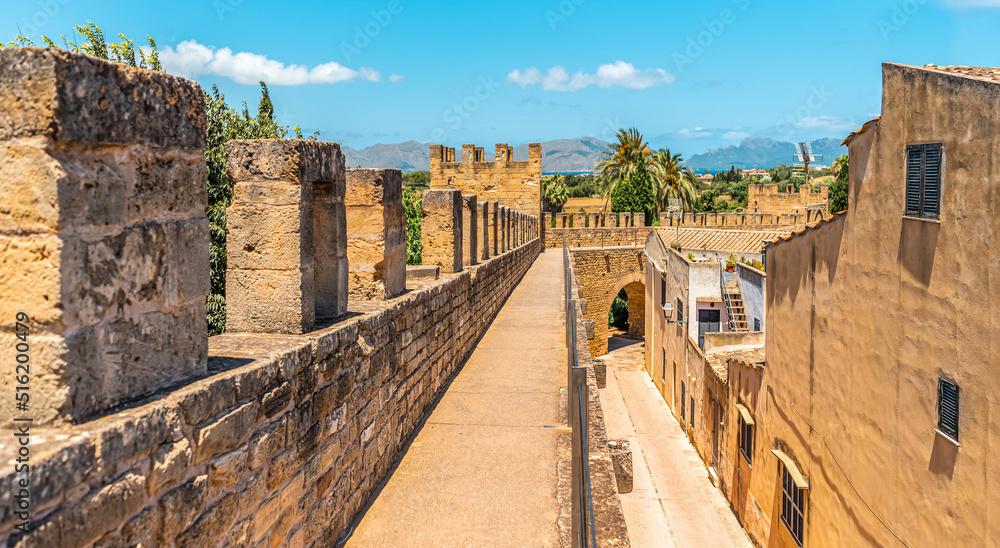 Walls of the Porta del Moll fortress in the old town of Alcudia, Mallorca island