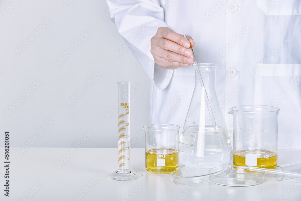 Chemical substance mixing, Laboratory and science experiments, Formulating the chemical for medical research, Quality control of petroleum oil industry products concept.
