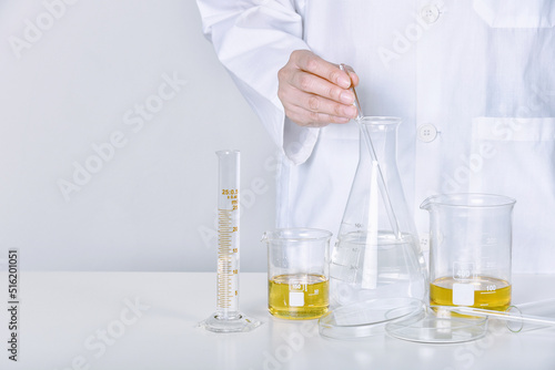 Obraz na płótnie Chemical substance mixing, Laboratory and science experiments, Formulating the chemical for medical research, Quality control of petroleum oil industry products concept. w salonie