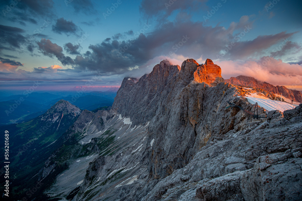 Summer sunrise in the Alps on the top of the Dachstein 3000 m.