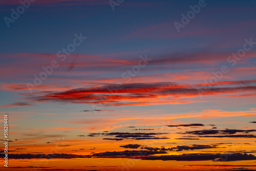 Orange and yellow cloudscape above the horizon