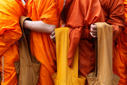 Monks lining to receive alms on Meak Bochea (Makha Bucha) holiday