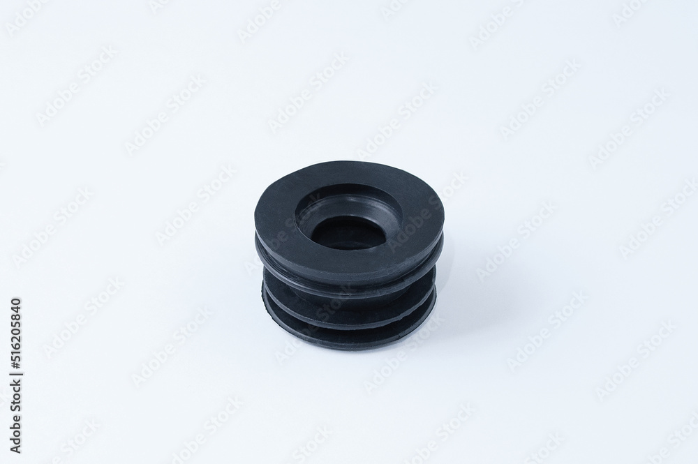 Rubber cuff seal plumbing for drain hose of the washing machine. White background. Rubber cuff seal plumbing for drain hose of the washing machine. White background.