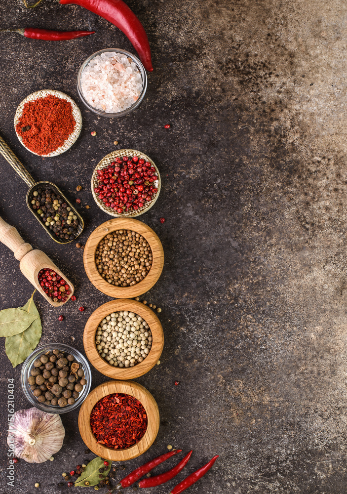various spices on a brown background various spices on a brown background