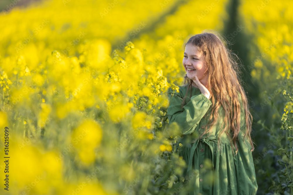 Teenage girl  the field rapeseed 