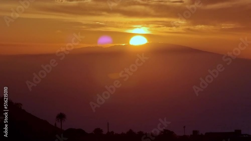 Puesta de sol tras la isla de La Palma visto desde Tegueste