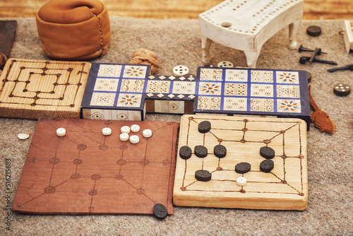 Mill and Royal Ur game, popular in ancient Roman. Reconstruction of board games from the Roman Empire photo