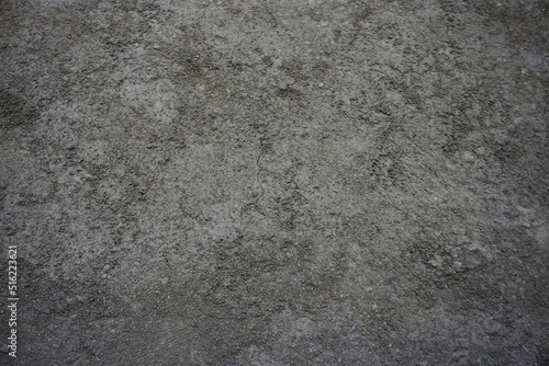 Trockener grauer Sandboden mit Muster