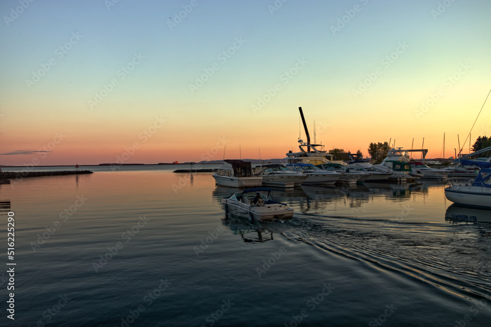 Sundown turns the horizon orange - Thunder Bay Marina, Ontario, Canada