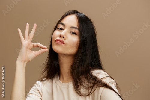 woman attractive look charmin in a t-shirt studio model