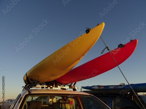 Two kayaks attached to the racks on the roof of the car in Western Australia