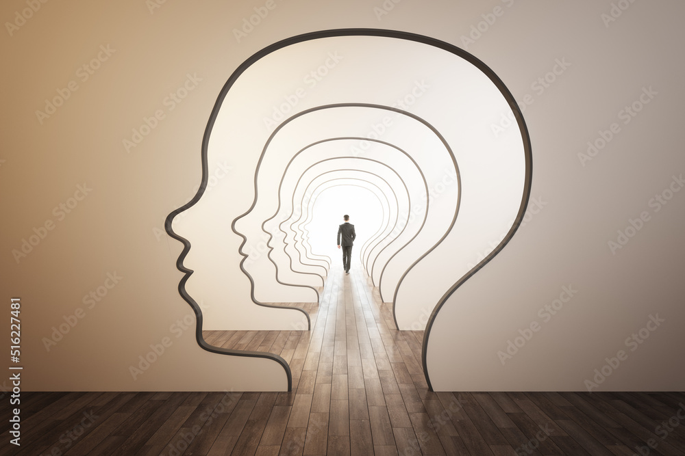 © Who is Danny - Abstract image of businessman walking through head outline corridor. Thinking, maze, solution and answer search concept.