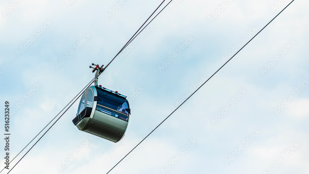 Cable car cabin on sky background. Ropeway gondola close up Cable car cabin on sky background. Ropeway gondola close up