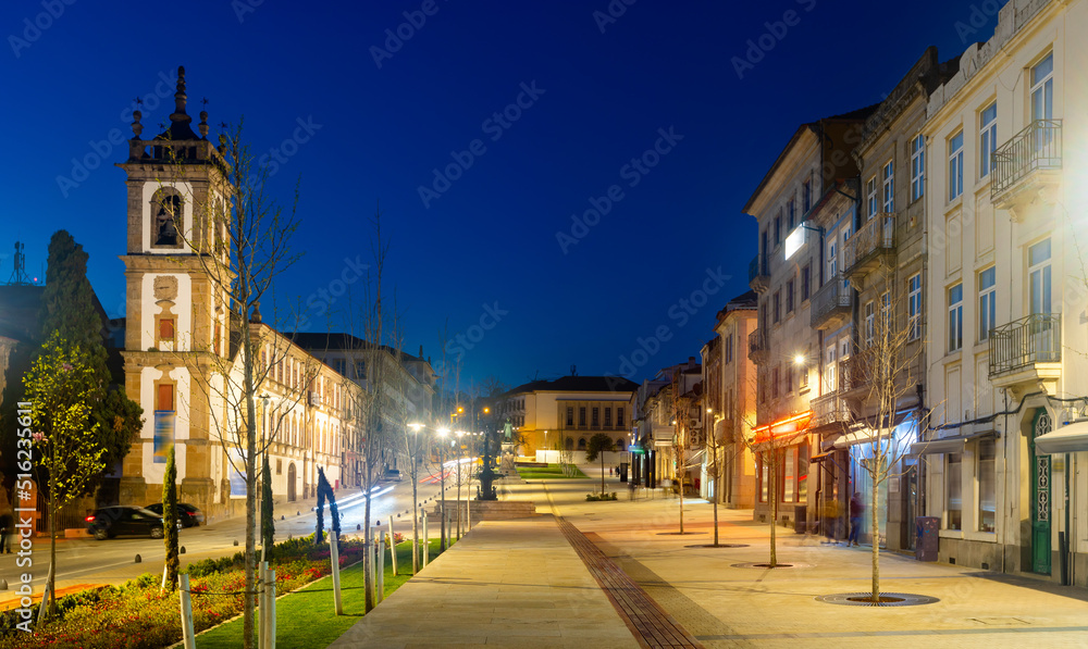 Evening photo of Av. Carvalho Araujo with turned on city lights. Main avenue of Vila Real, Portugal.