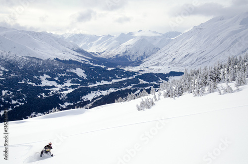 Alaska snowmachine rider in the backcountry 