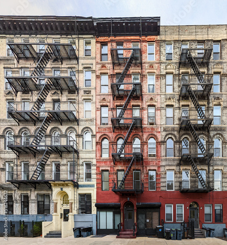 Exterior view of old apartment buildings with fire escapes in the East Village n Fototapet