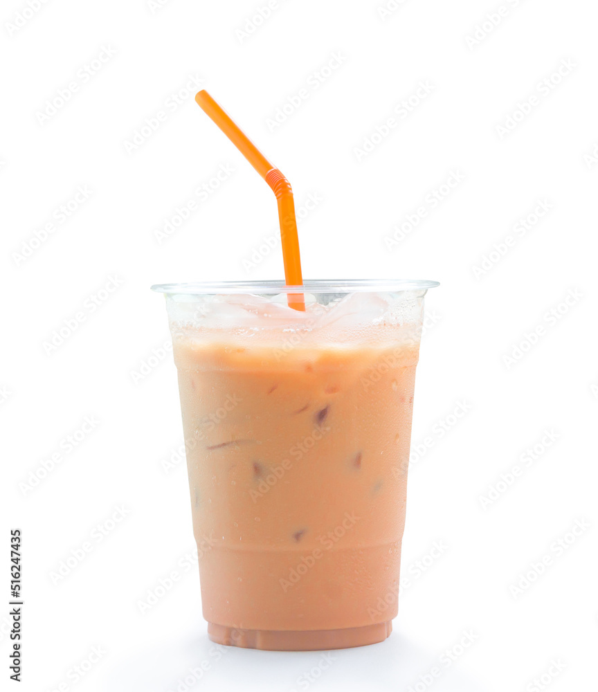 Orange Thai iced condensed milk tea in transparent plastic glass with straw isolated on white background with clipping path Orange Thai iced condensed milk tea in transparent plastic glass with straw isolated on white background with clipping path