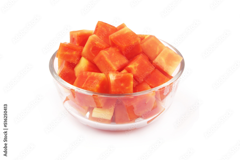 Papaya fruit slices in glass bowl isolated on white background Papaya fruit slices in glass bowl isolated on white background