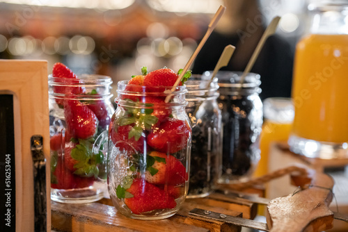 berries in glass jars