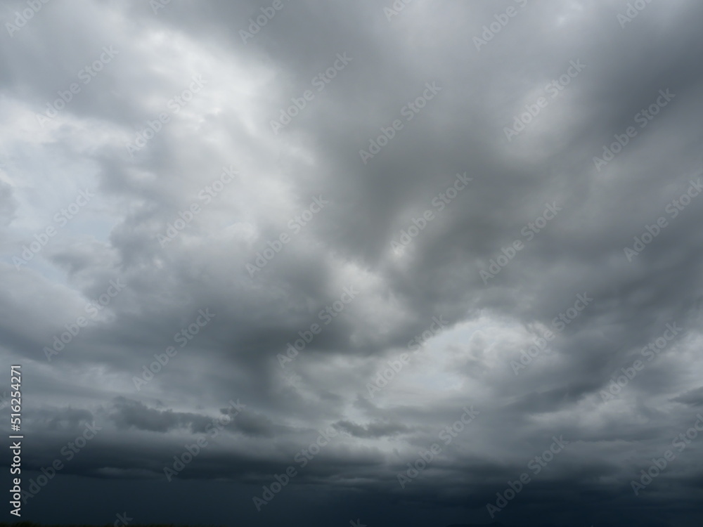 Cumulonimbus cloud formations on tropical blue sky , Nimbus moving , Abstract background from natural phenomenon and gray clouds hunk , Thailand Cumulonimbus cloud formations on tropical blue sky , Nimbus moving , Abstract background from natural phenomenon and gray clouds hunk , Thailand
