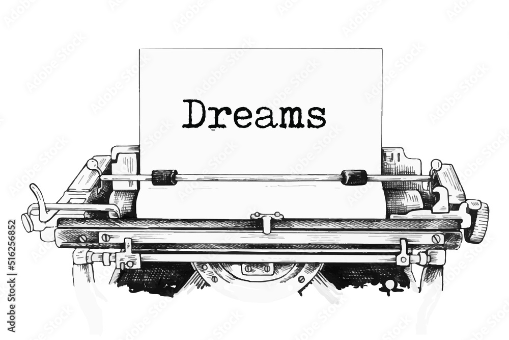 Dreams typed words on a vintage typewriter. Close up.