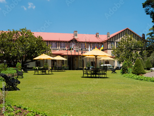 Nuwara Eliya, Sri Lanka - March 10, 2022: View of the Grand Hotel built in the colonial style. The hotel is beautifully landscaped