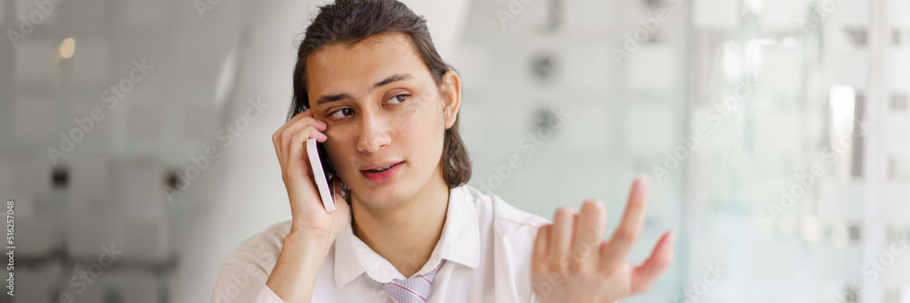 Business concept, Businessman is using phone to talking about planning project with team colleague Business concept, Businessman is using phone to talking about planning project with team colleague
