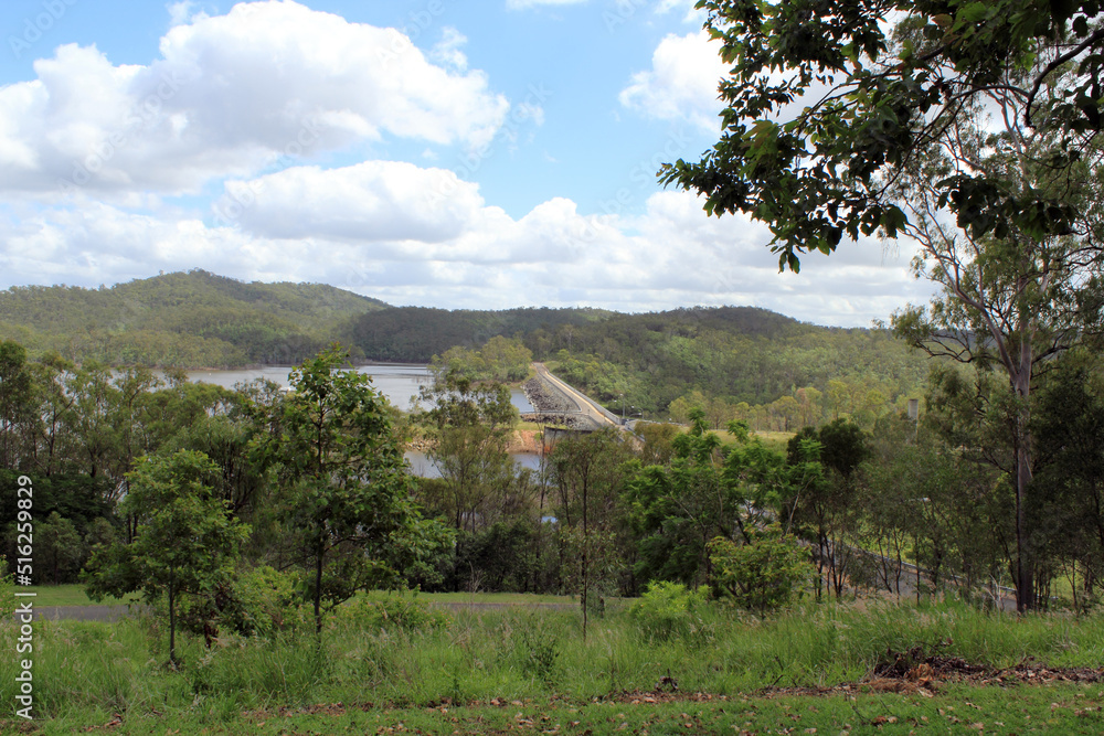 Road leading over Lake Monduran which is surrounded by bushland