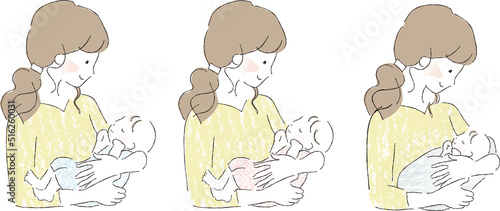 赤ちゃんを抱っこするお母さん