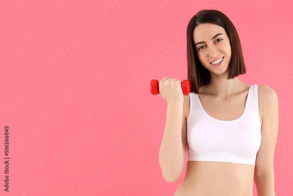 Concept of weight loss with slim young woman on pink background Concept of weight loss with slim young woman on pink background