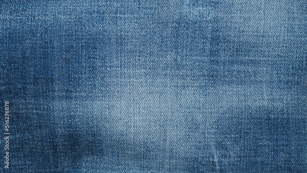 Blue jeans fabric background texture. Close up view. Blue jeans fabric background texture. Close up view.