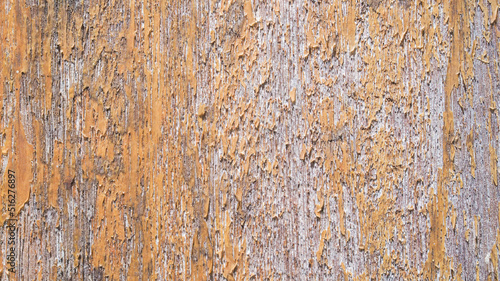 Old worn planked wooden fence texture background.