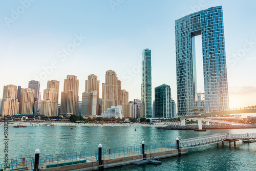 Dubai jumeirah beach with marina skyscrapers in UAE
