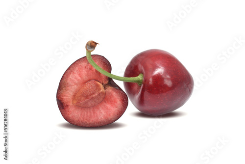 Sweet cherry whole and half of fruit isolated on white