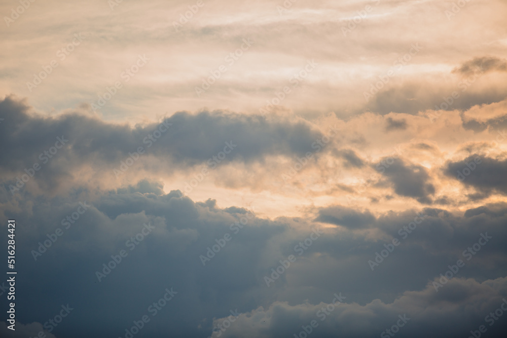 The morning sky looked like a bright golden sky. Sunrise is decorated with clouds of various shapes. Looks beautiful.