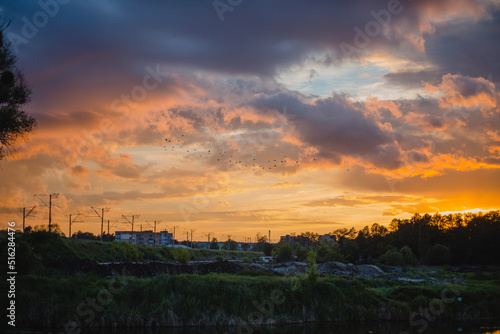 The morning sky looked like a bright golden sky. Sunrise is decorated with clouds of various shapes. Looks beautiful.