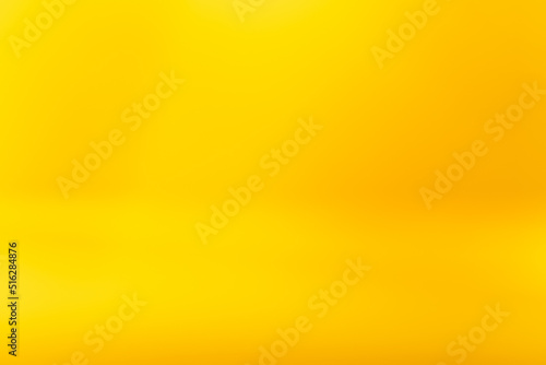 Orange abstract background. Glowing color gradient. Sun radiance. Defocused yellow smooth light glare bright surface decorative design with copy space. photo