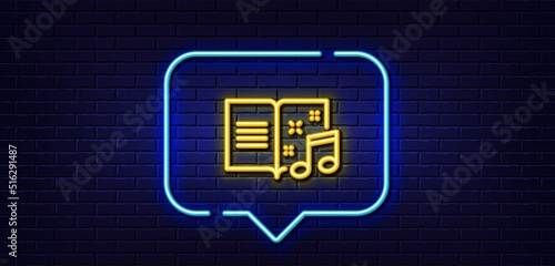 Neon light speech bubble. Music book line icon. Musical note sign. Neon light background. Music book glow line. Brick wall banner. Vector